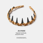 Korean version autumn and winter new leopard print with teeth wavy headband women wash face pressure hair advanced sense non-slip headband hair accessories headgear