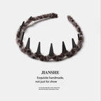 Korean version autumn and winter new leopard print with teeth wavy headband women wash face pressure hair advanced sense non-slip headband hair accessories headgear